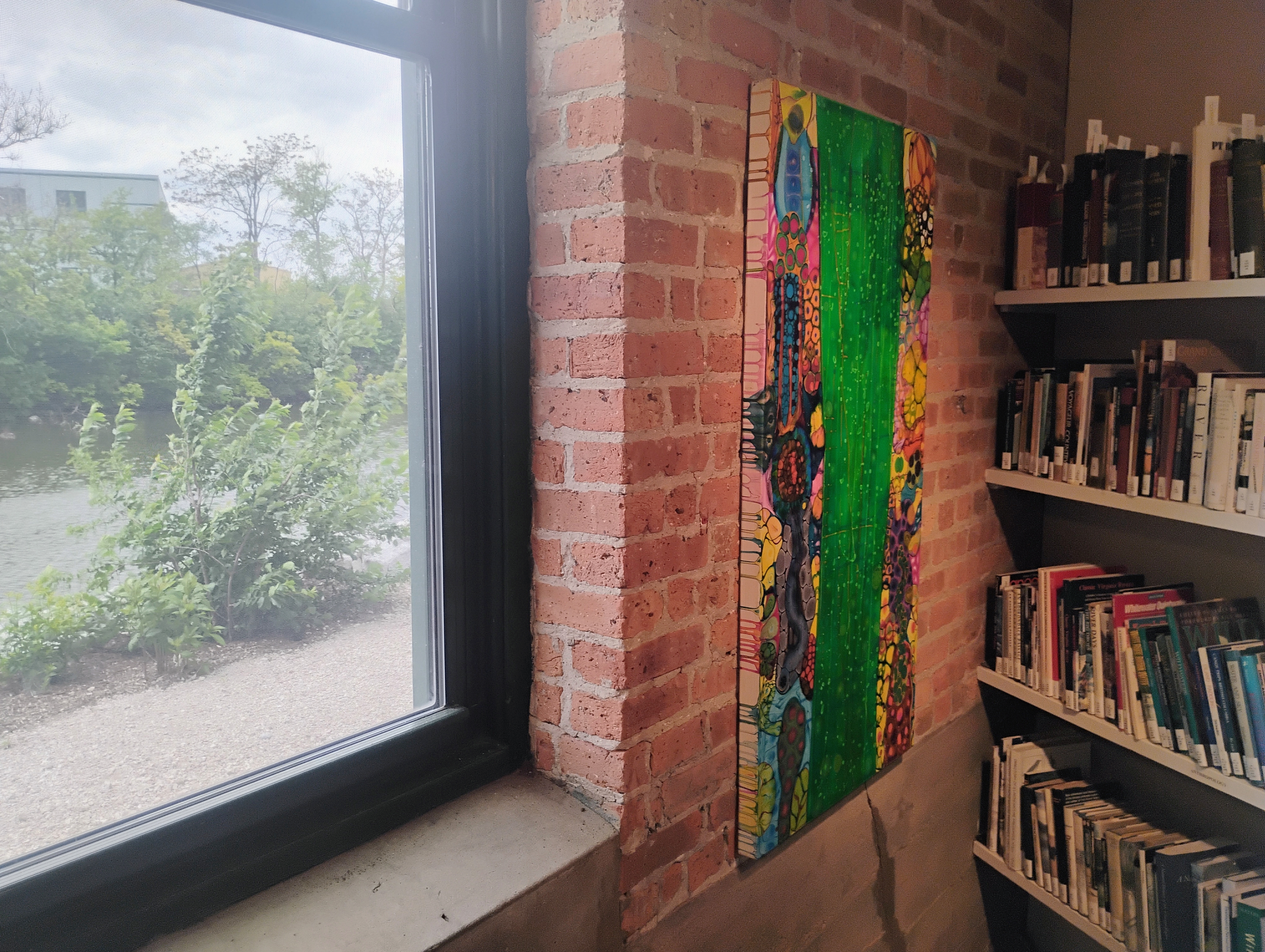 Big Shoulders, Wet Feet colorful artwork near window