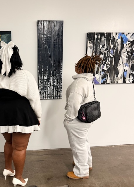 Our Kind of Town visitors viewing artwork
