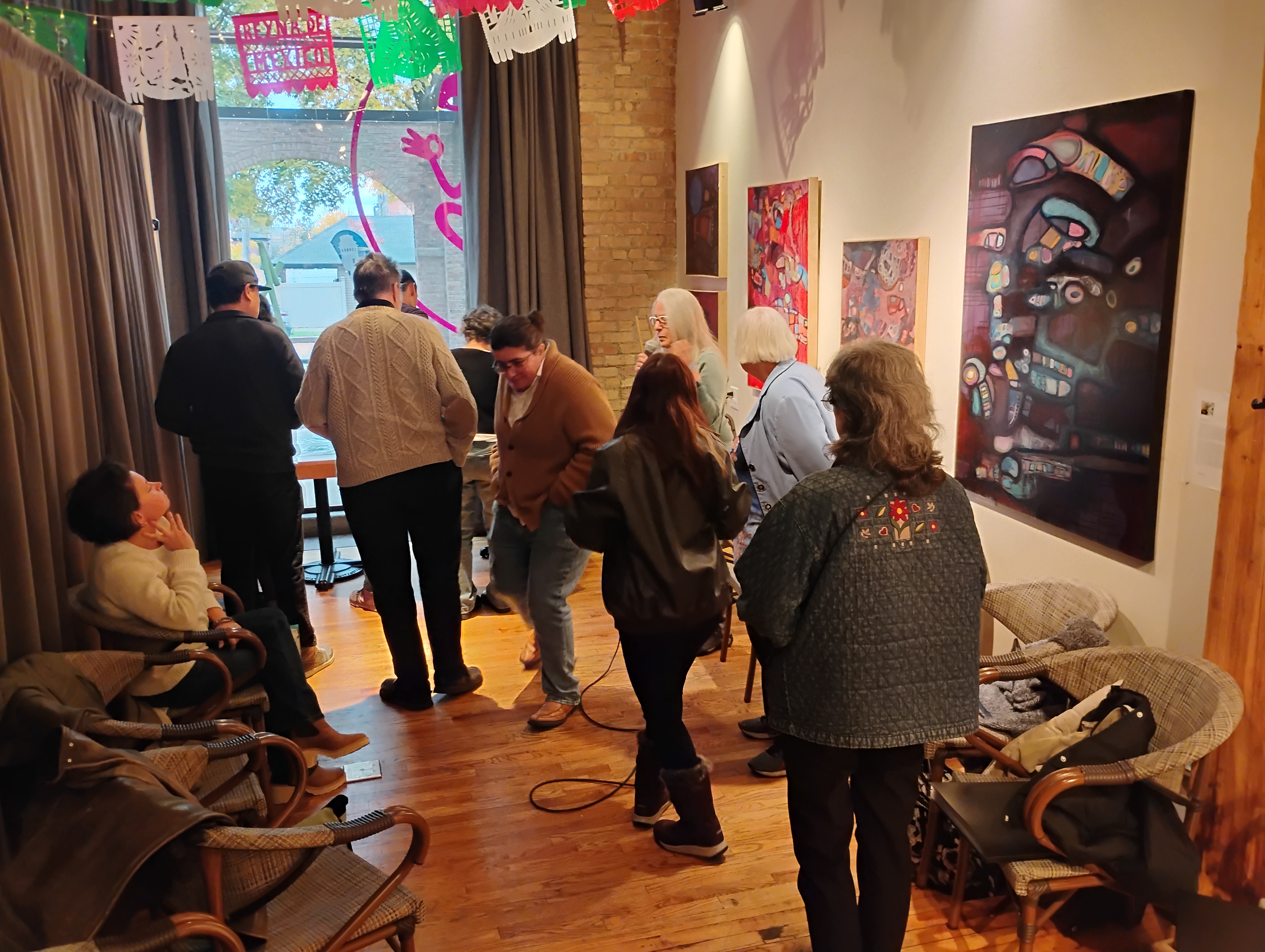 Art Salon attendees and artwork