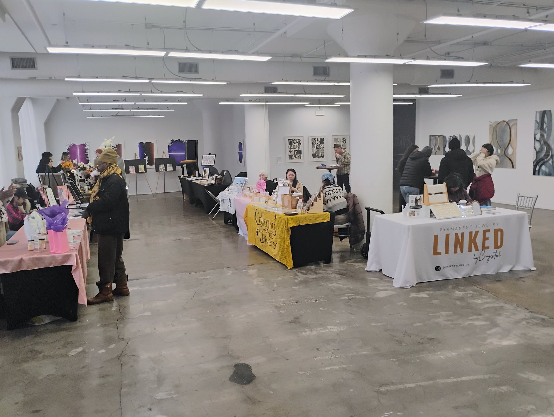 Vjosa Market vendor tables and visitors